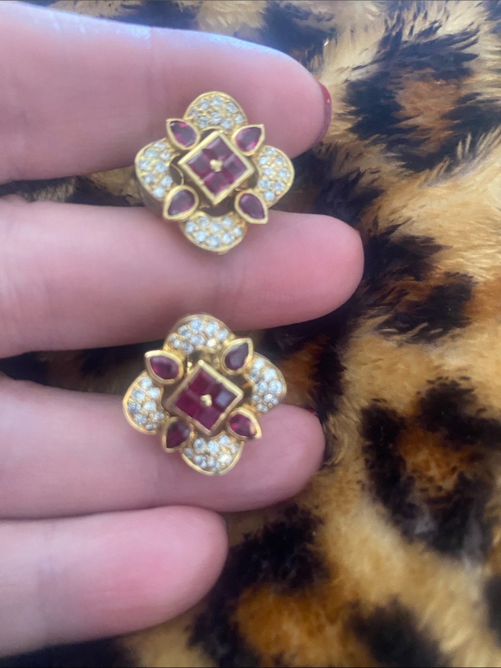 18 kt yellow gold ruby and diamond earrings.